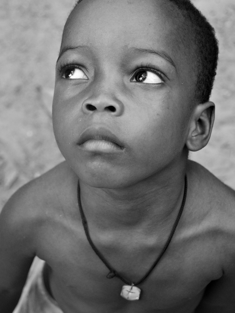 boy looks god in the eye bw scaled 1